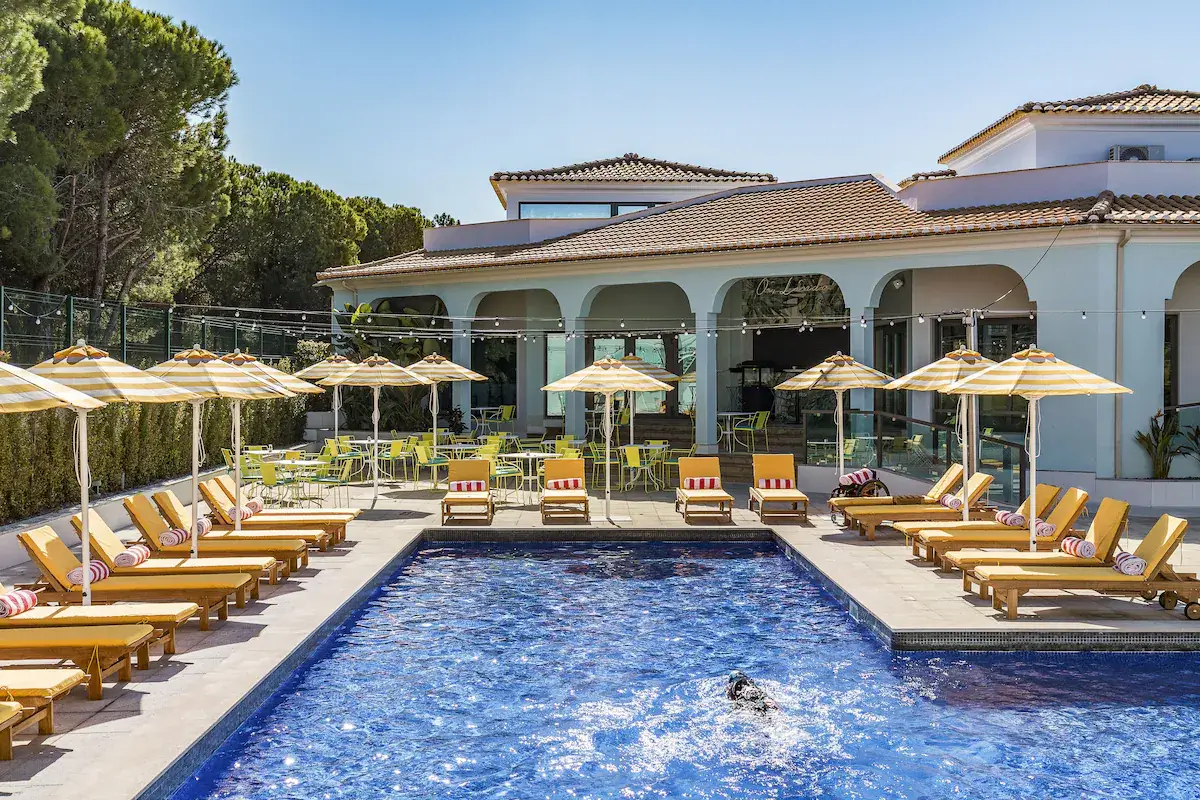 The Magnolia Hotel Pool and Hotel Outside